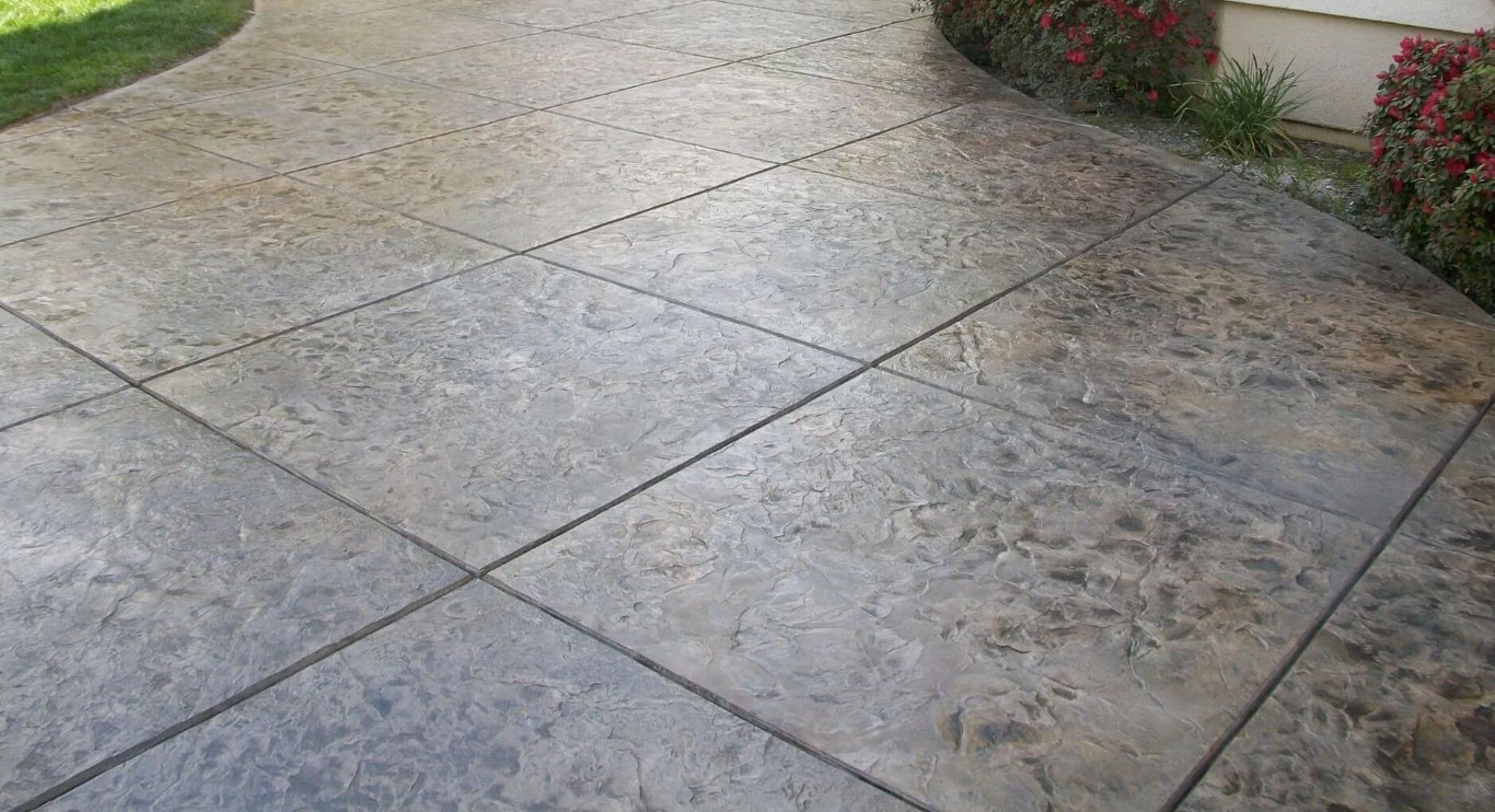 Professional stamped concrete installation showcasing decorative patterns in Calexico, CA